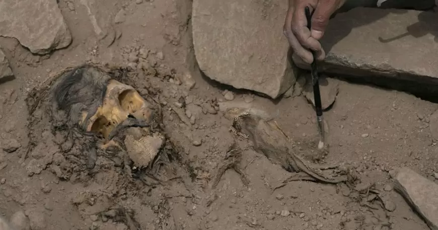 Archaeologists find buried mummy next to soccer field in Peru